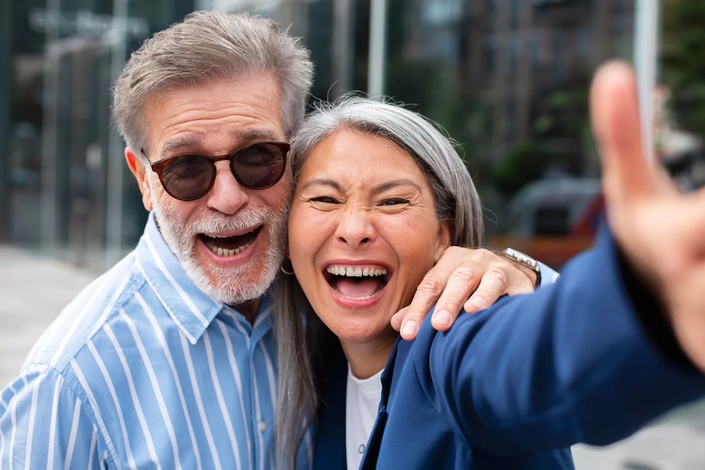 husband and wife going to lumi family dentistry in Sachse, TX 75048 for dentures